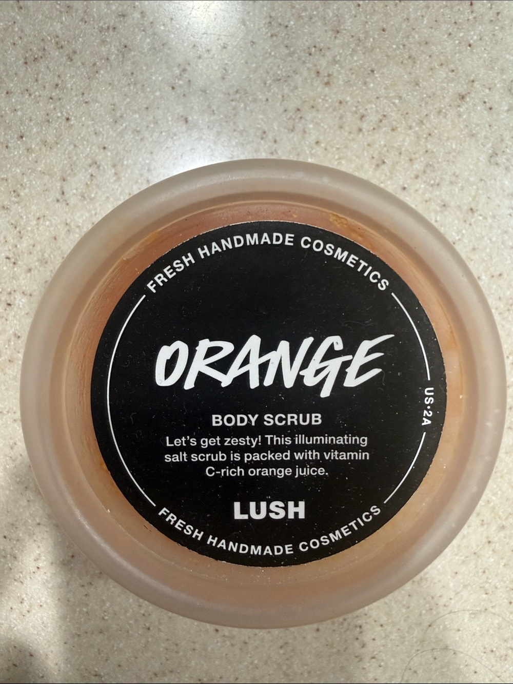 LUSH Orange Body Scrub — packed with Vitamin C rich orange juice.